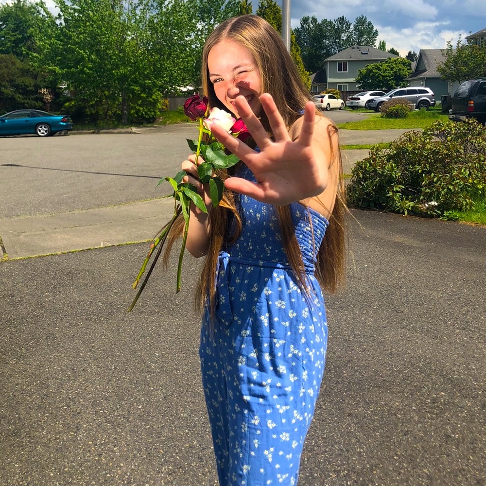 A blue flowered romper